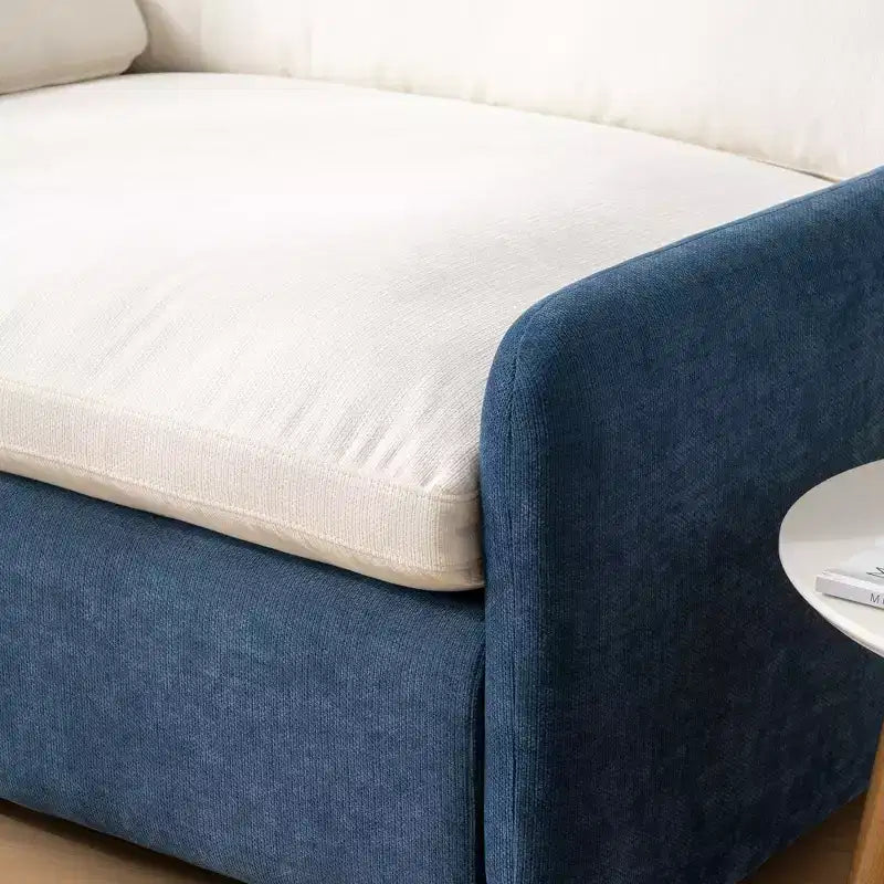 Fauteuil chenille surdimensionné avec assise profonde et coussins décoratifs