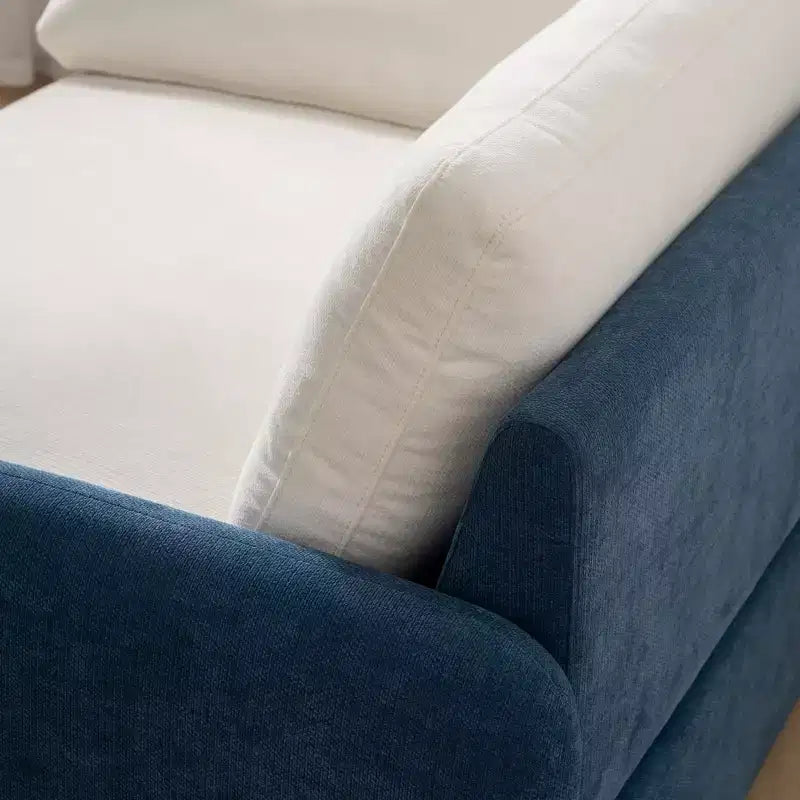 Fauteuil chenille surdimensionné avec assise profonde et coussins décoratifs