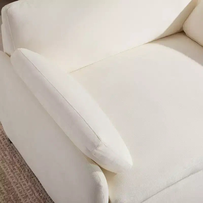 Fauteuil chenille surdimensionné avec assise profonde et coussins décoratifs