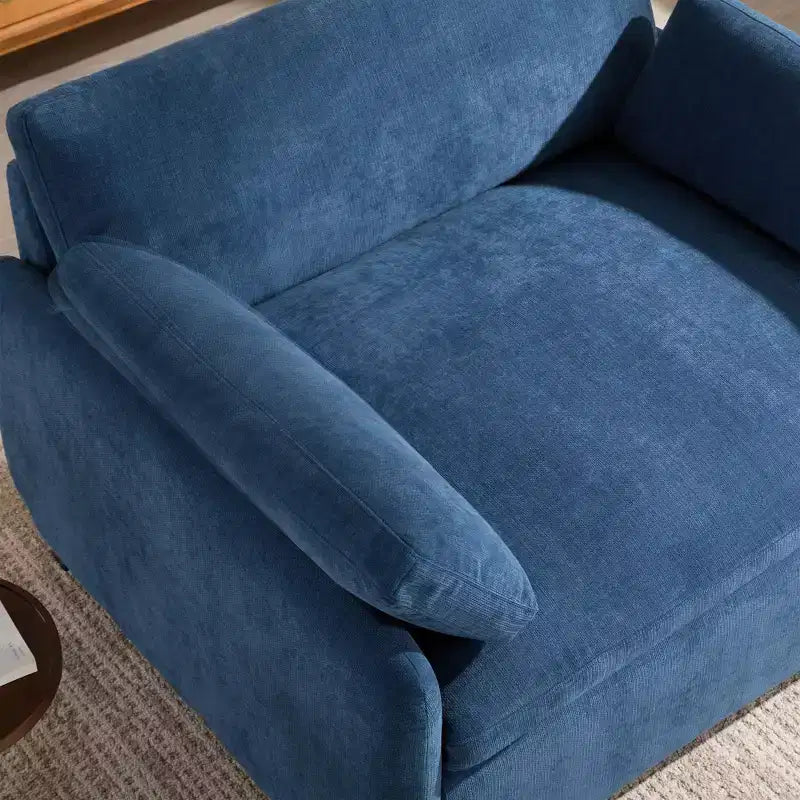 Fauteuil chenille surdimensionné avec assise profonde et coussins décoratifs