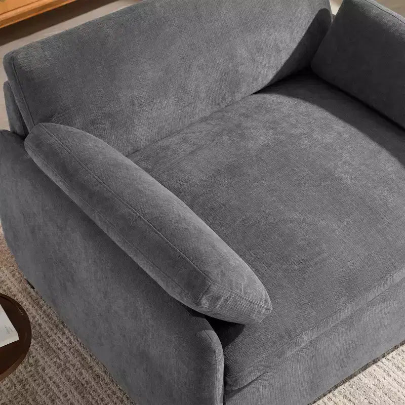 Fauteuil chenille surdimensionné avec assise profonde et coussins décoratifs