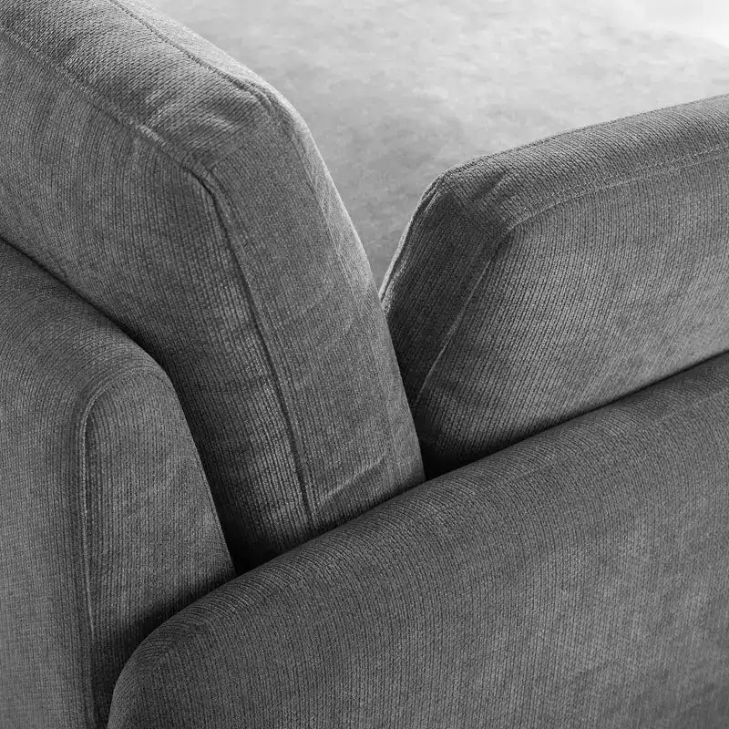 Fauteuil chenille surdimensionné avec assise profonde et coussins décoratifs