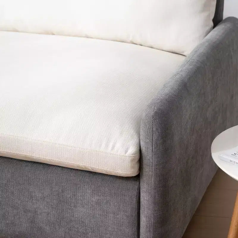 Fauteuil chenille surdimensionné avec assise profonde et coussins décoratifs