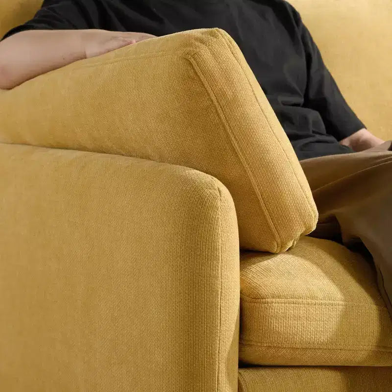 Fauteuil chenille surdimensionné avec assise profonde et coussins décoratifs