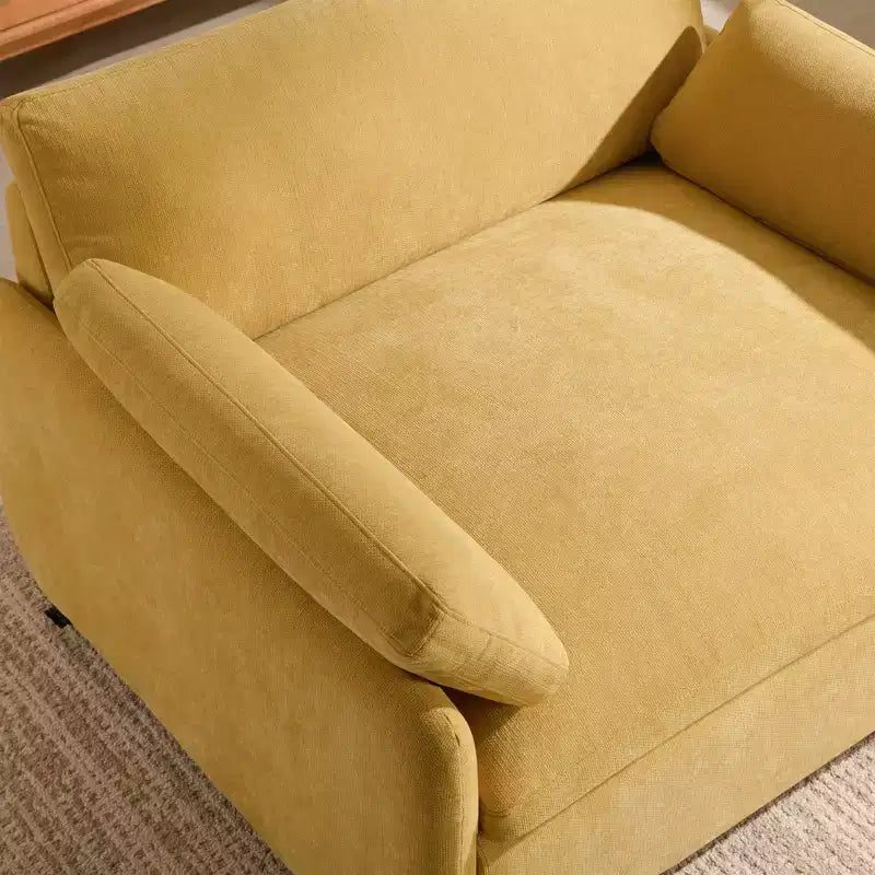 Fauteuil chenille surdimensionné avec assise profonde et coussins décoratifs