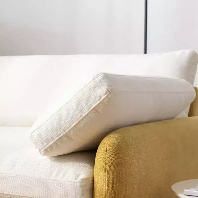 Fauteuil chenille surdimensionné avec assise profonde et coussins décoratifs
