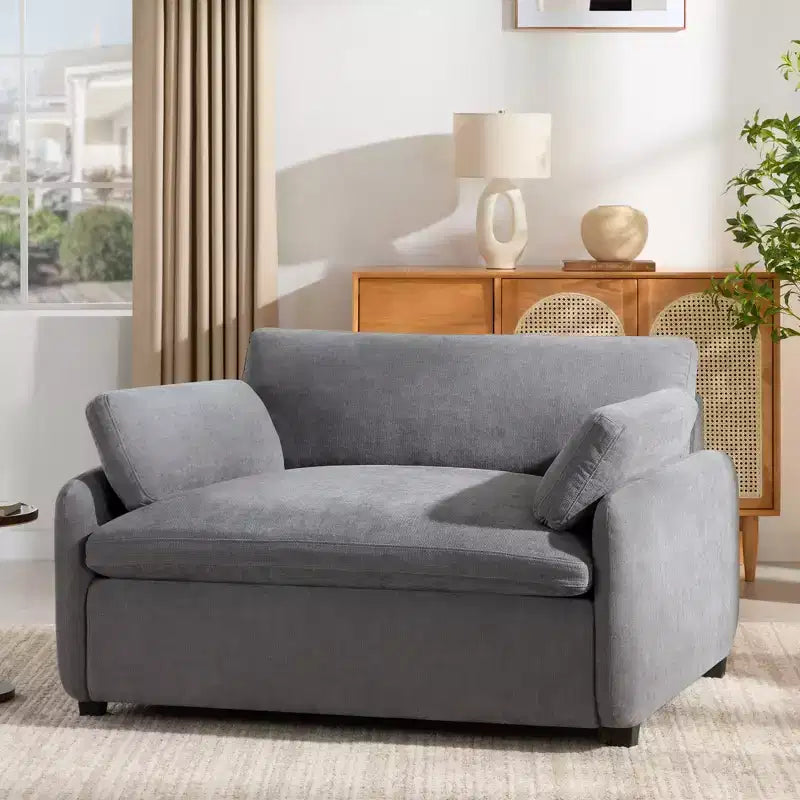 Fauteuil chenille surdimensionné avec assise profonde et coussins décoratifs